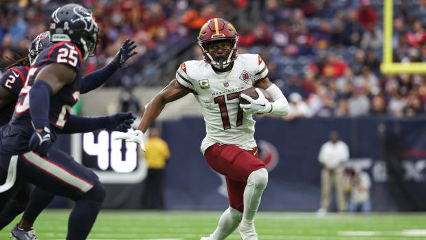 Nov 20, 2022; Houston, Texas, USA; Washington Commanders wide receiver Terry McLaurin (17) runs with the ball during the second quarter against the Houston Texans at NRG Stadium.